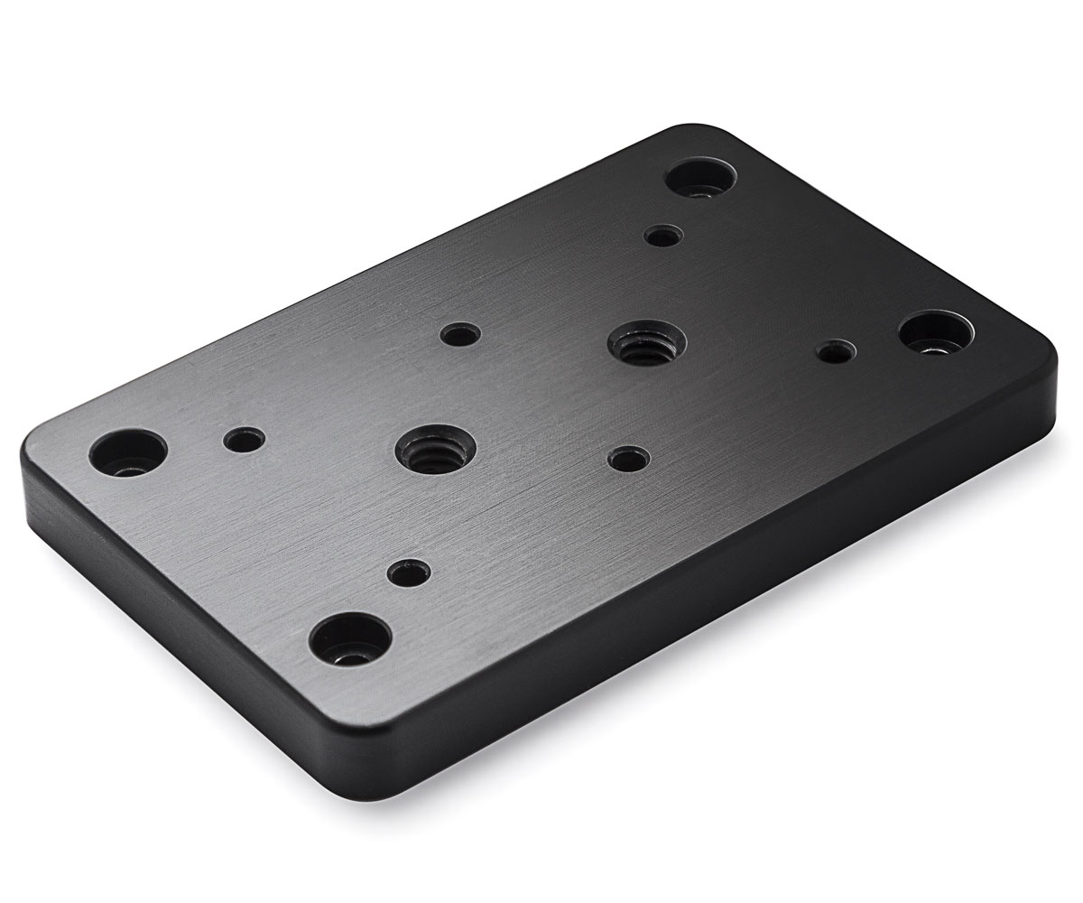 Bolex cheese plate showcased on white background. Designed for rear attachment on Bolex cameras.