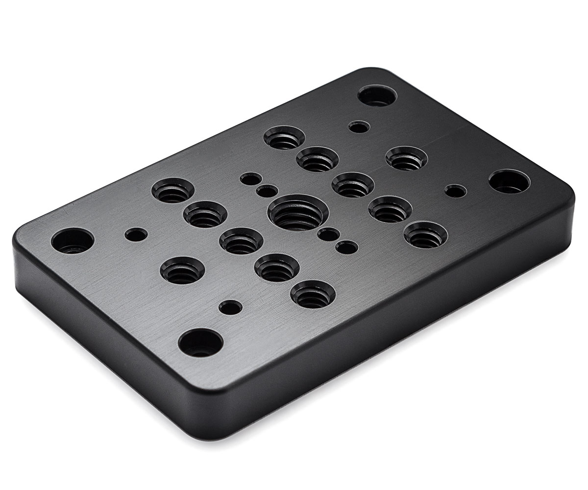 Bolex cheese plate showcased on white background. Designed for rear attachment on Bolex cameras.