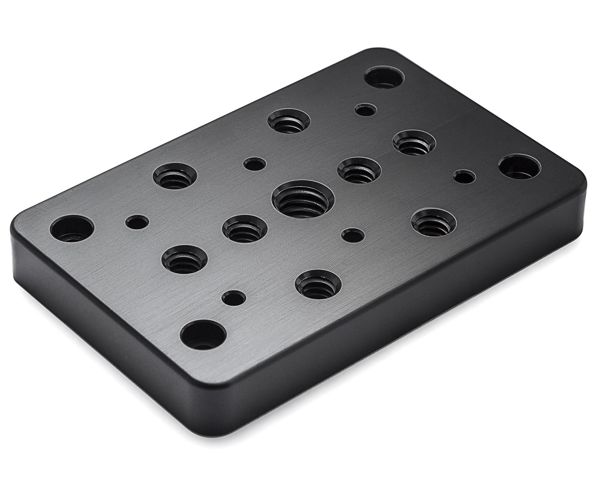 Bolex cheese plate showcased on white background. Designed for rear attachment on Bolex cameras.