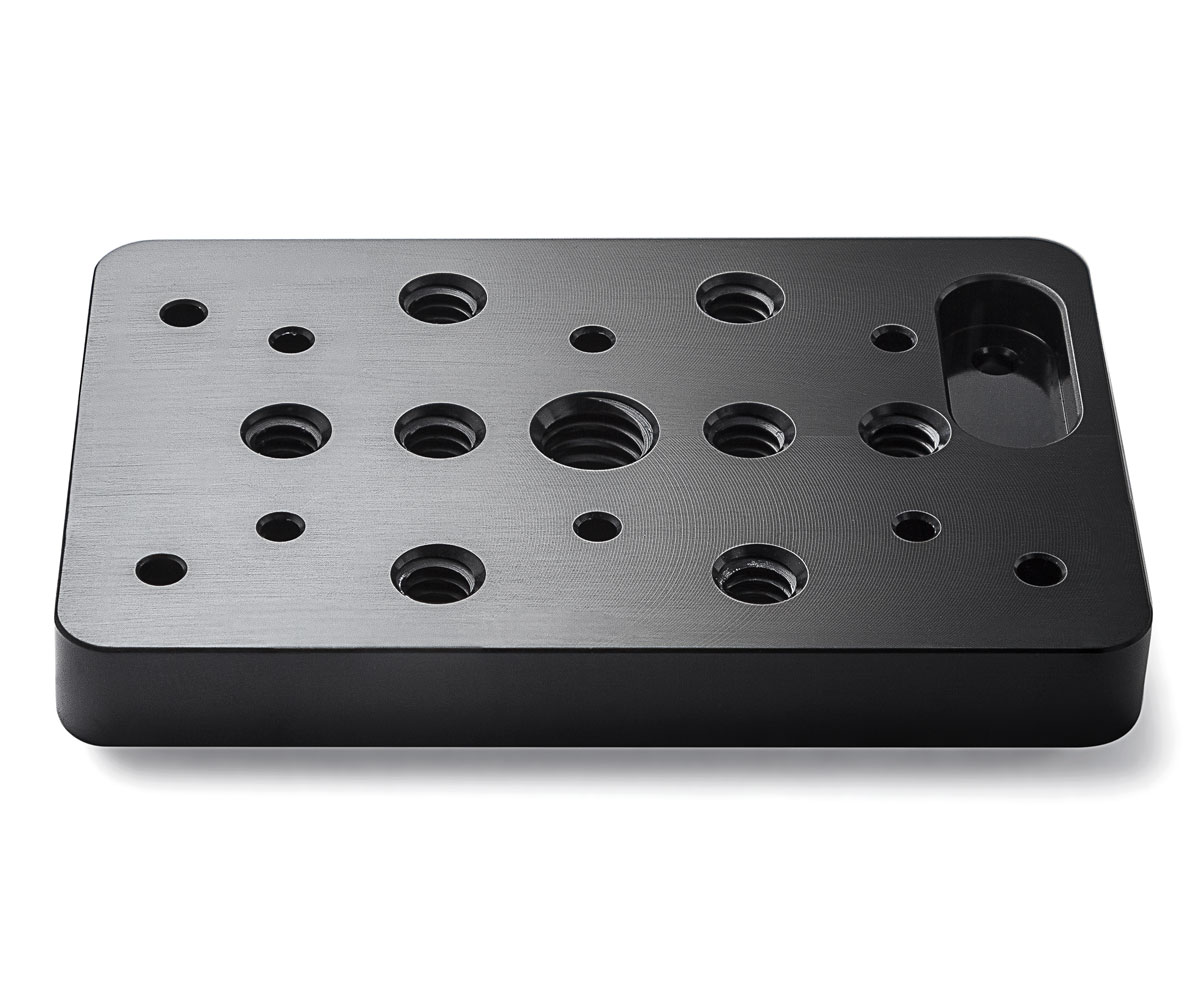 Back of the Bolex cheese plate showcased on white background. Designed for rear attachment on Bolex cameras.