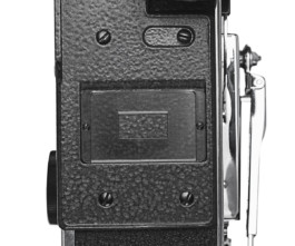 Back of Bolex REX5 showcased on white background. 