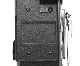 Back of Bolex REX5 showcased on white background. 