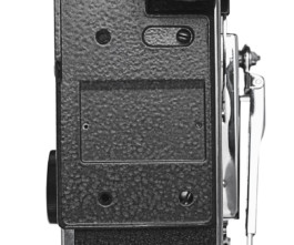 Back of Bolex REX5 showcased on white background. 