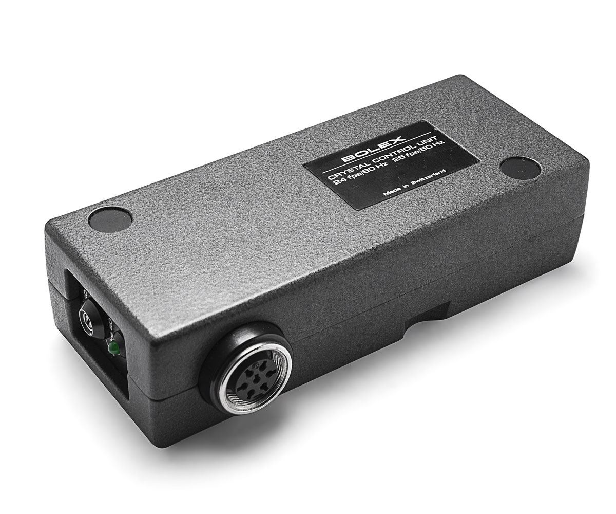 Bolex crystal sync unit showcased on white background.