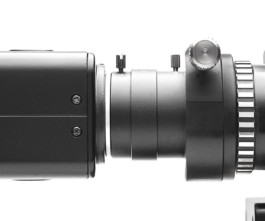 13X Viewfinder of the Bolex REX5 on a White Background with 13x adapter and video assist.