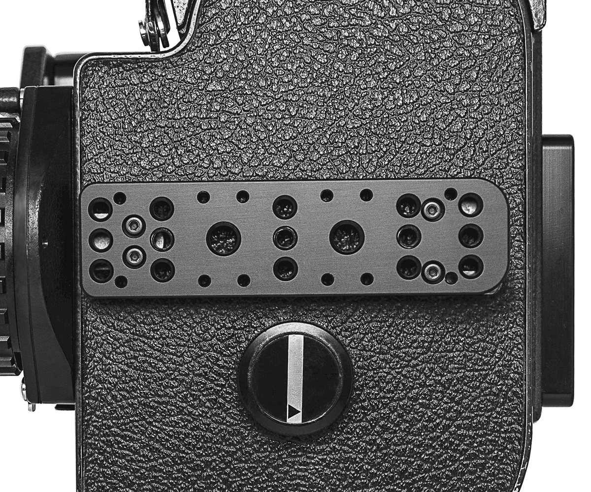 Side of Bolex EBM showcased on white background. 