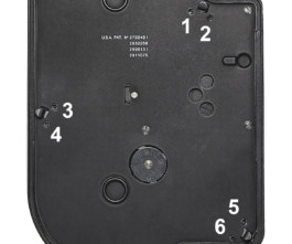 Bolex EBM camera on white background with open cover.