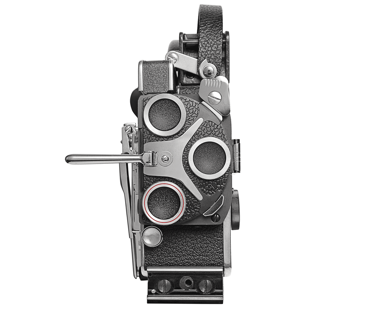 Bolex turret showcased on white background without lenses. 