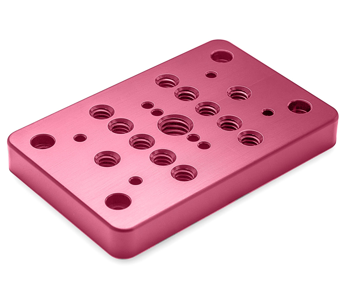 Bolex pink cheese plate showcased on white background. Designed for rear attachment on Bolex cameras.