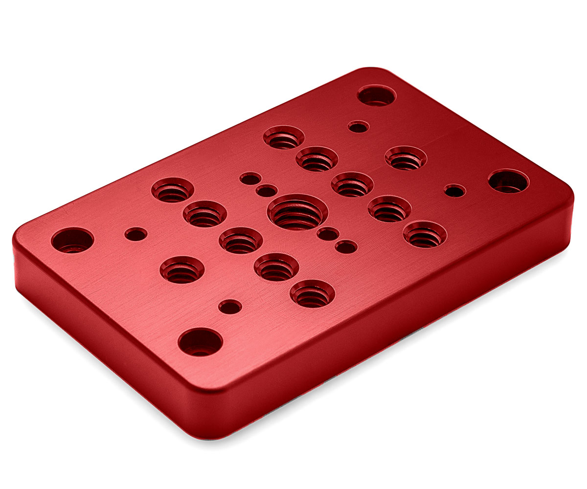 Bolex red cheese plate showcased on white background. Designed for rear attachment on Bolex cameras.