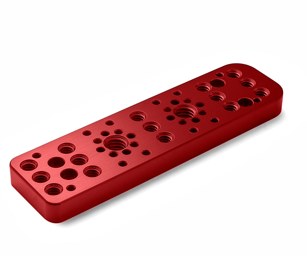Bolex red right side plate showcased on white background. Designed for door attachment on Bolex cameras.
