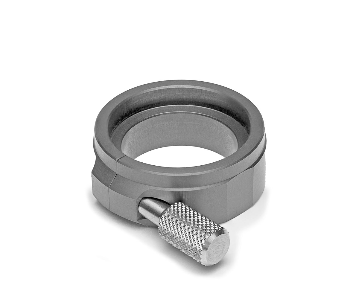 A studio photograph of the grey Bolex 13X viewfinder adapter.