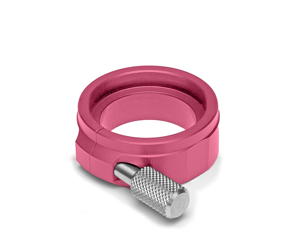 A studio photograph of the pink Bolex 13X viewfinder adapter.
