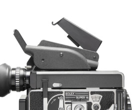 Bolex rex5 camera on white background with top plate. 