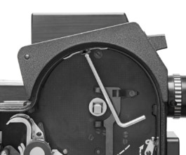 Bolex rex5 camera on white background with top plate. Open lid cover. 