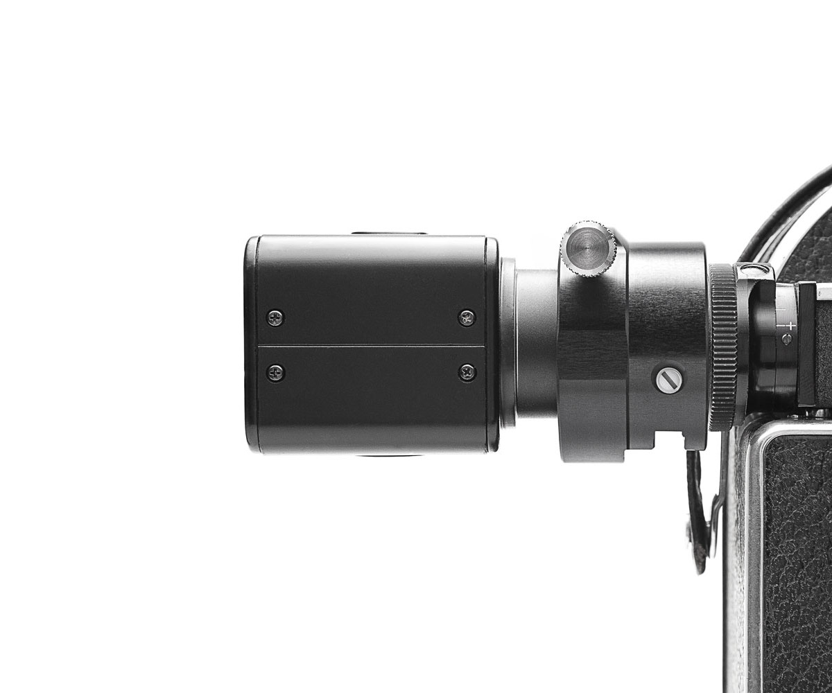 Bolex REX3 10× viewfinder with M12 video assist adapter installed.